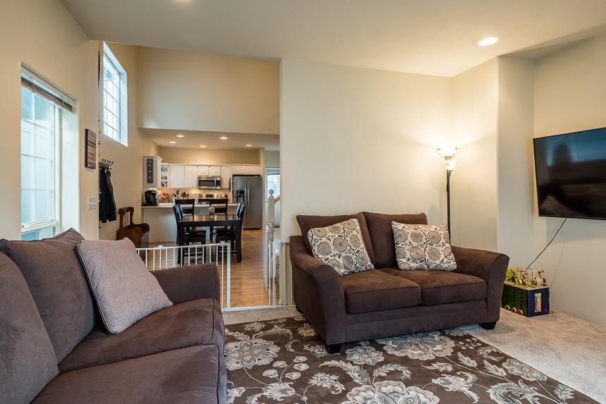 667 Shadow Way Central Point, OR 97502 - Photo 7 of 26 a living room with furniture and a flat screen tv
