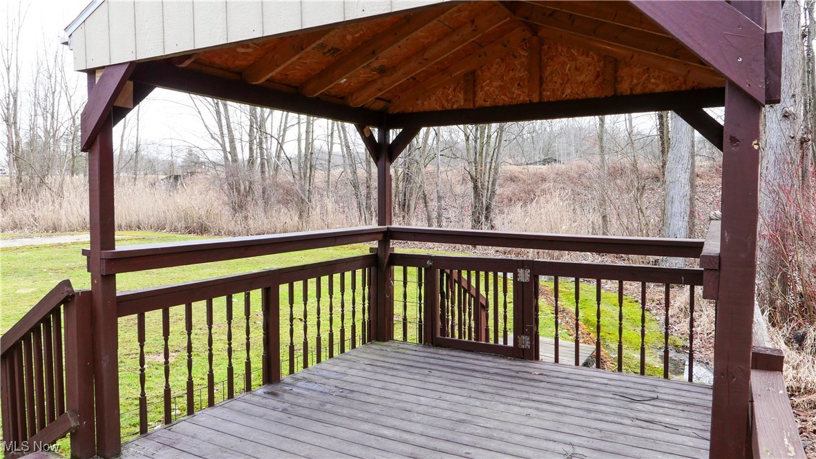 3792 Selnik Road Kent, OH 44240 - Photo 30 of 39 Deck with a lawn and a gazebo