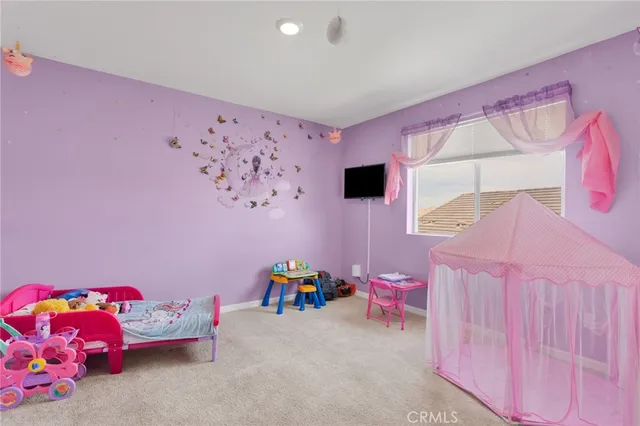 a bedroom with furniture and a bed