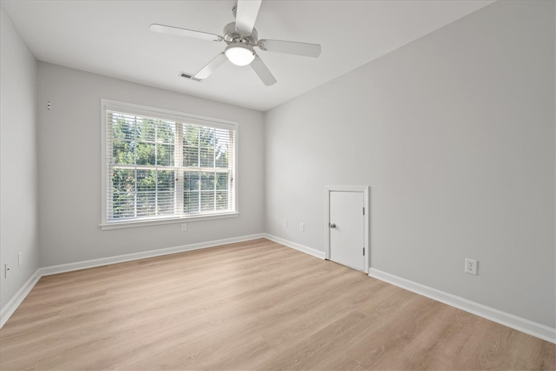 100 Shipyard Circle Anderson, SC 29621 - Photo 27 of 40 This spacious room features ample natural light and durable flooring, offering versatile living options.
