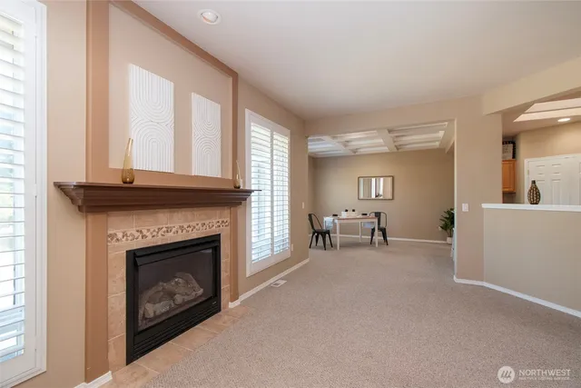 a view of livingroom with furniture and fireplace
