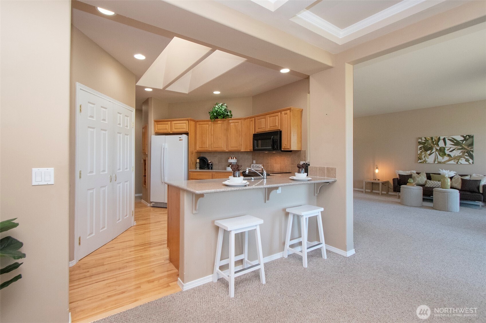 40 Cascadia Loop Sequim, WA 98382 - Photo 19 of 40 a kitchen with a sink cabinets and window