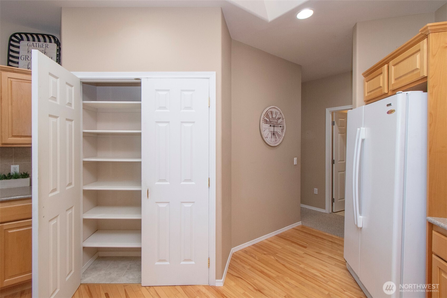 40 Cascadia Loop Sequim, WA 98382 - Photo 21 of 40 a view of bedroom with a bed and wooden floor