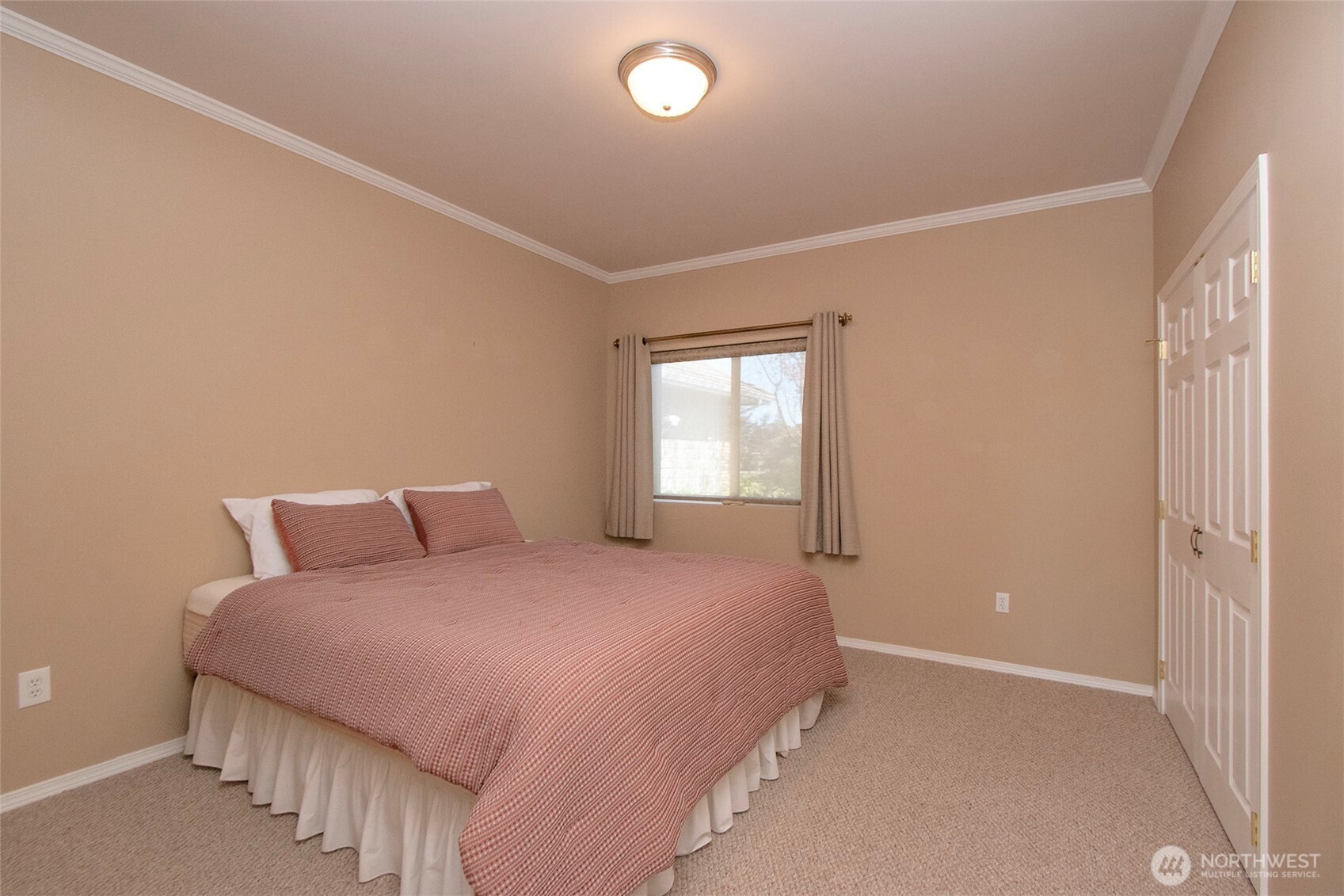 40 Cascadia Loop Sequim, WA 98382 - Photo 25 of 40 a bedroom with a bed and a window