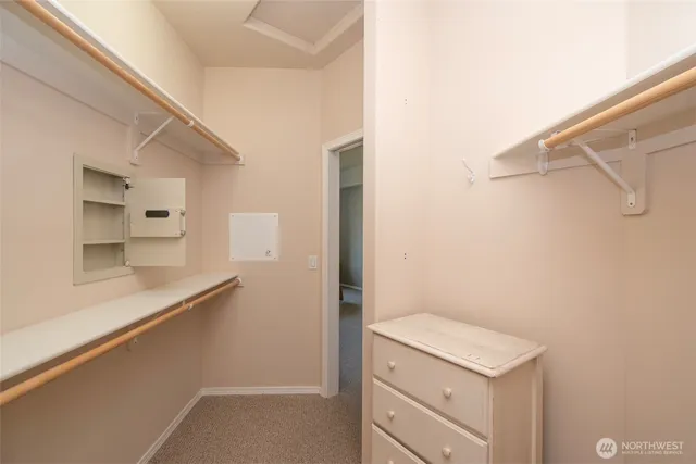 a spacious bathroom with a double vanity sink mirror and double