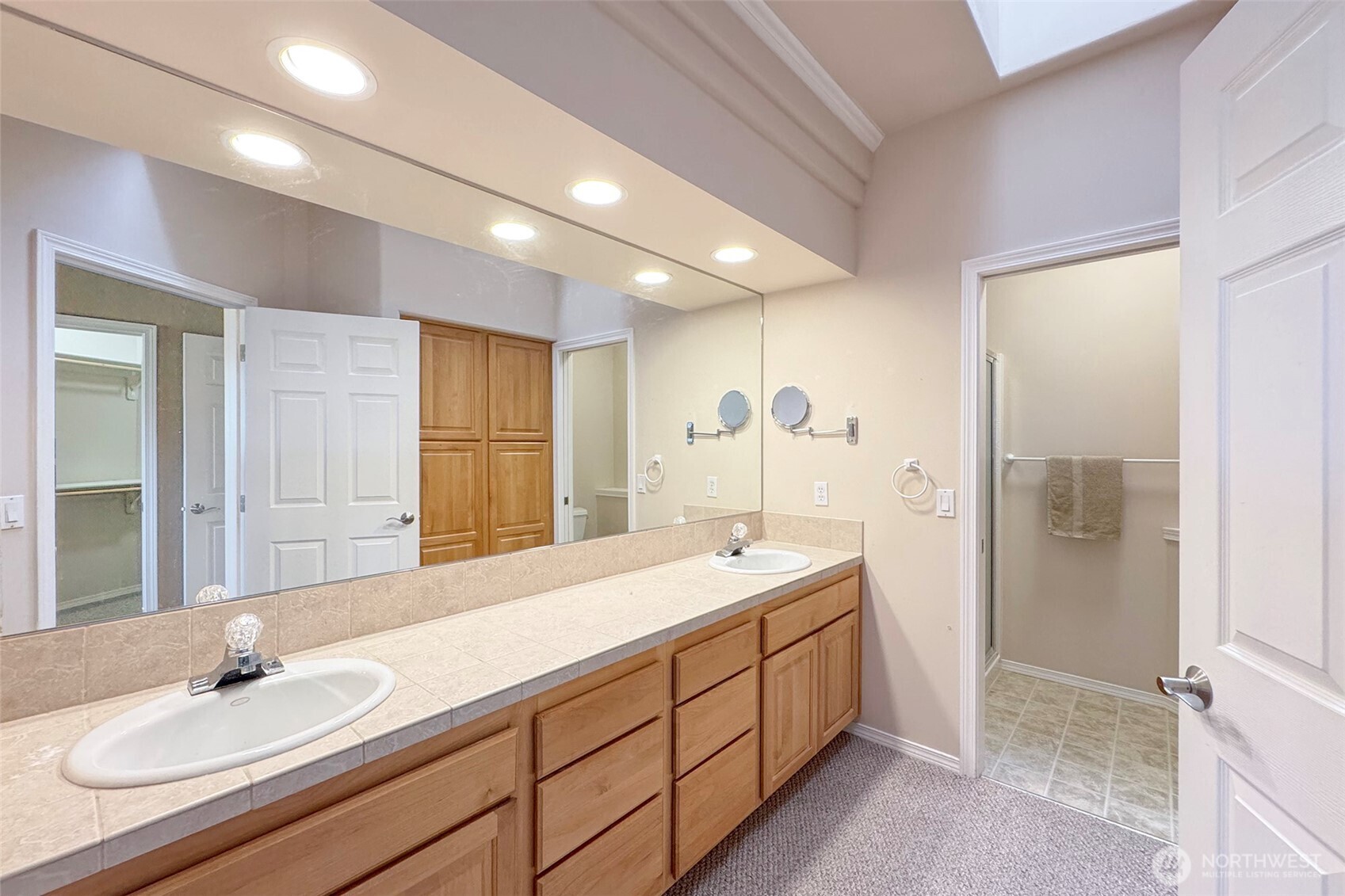 40 Cascadia Loop Sequim, WA 98382 - Photo 29 of 40 a spacious bathroom with a double vanity sink mirror and double