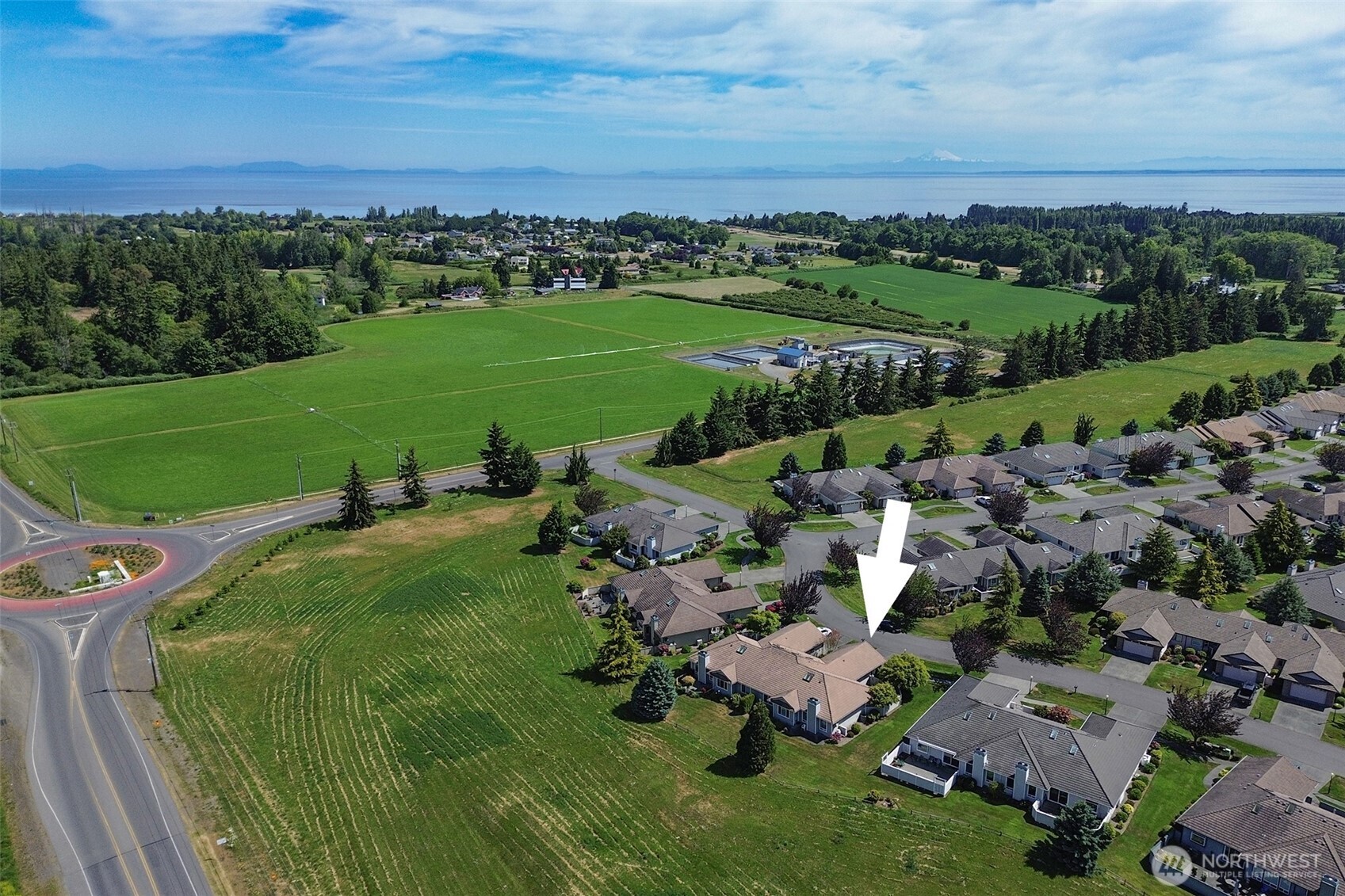 40 Cascadia Loop Sequim, WA 98382 - Photo 40 of 40 an aerial view of a town with residential houses and outdoor space