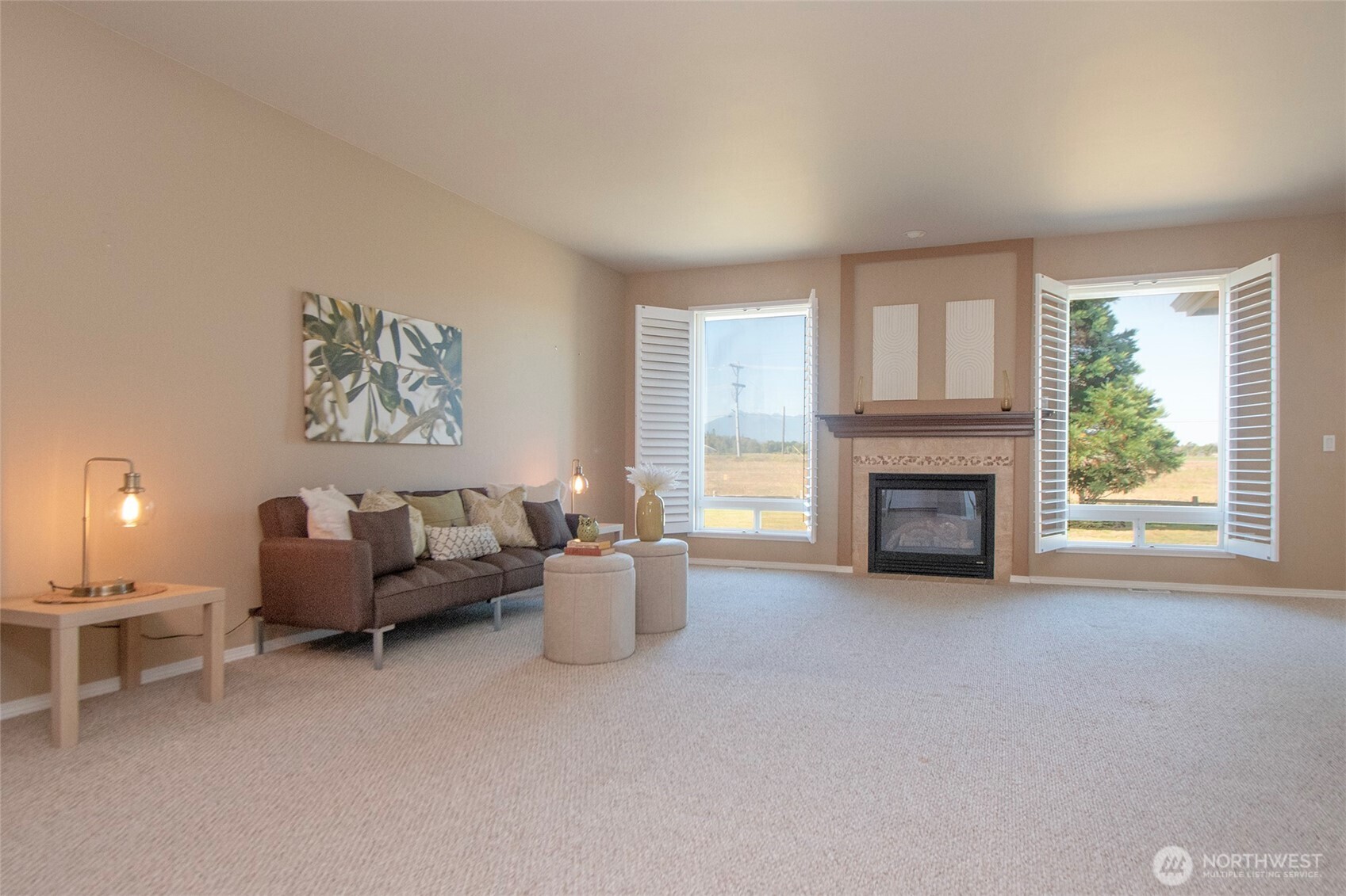 40 Cascadia Loop Sequim, WA 98382 - Photo 10 of 40 a living room with furniture and a fireplace