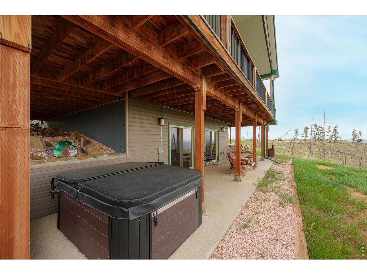1291 Little Whale Road Bellvue, CO 80512 - Photo 32 of 43 ...and right outside on the patio enjoy the hot tub while watching the wildlife pass through