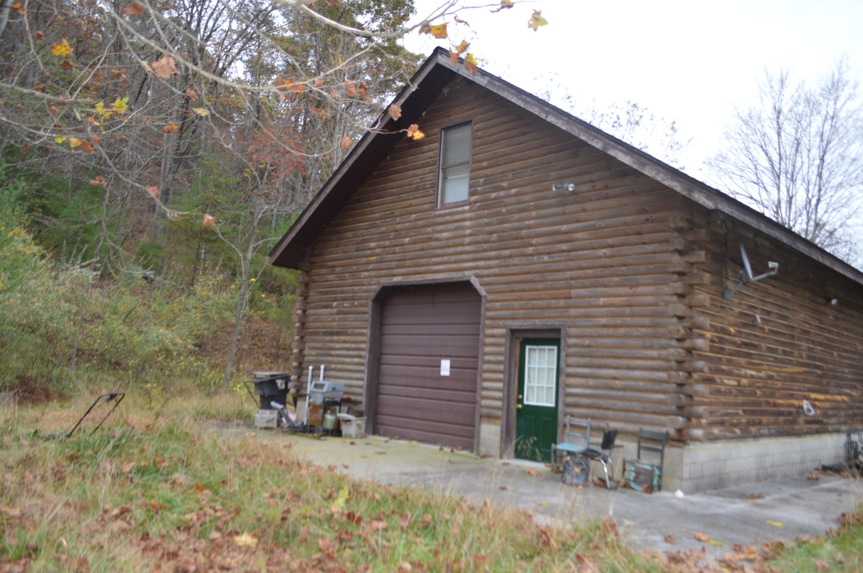 266 Grannys Branch Road New Castle, VA 24127 - Photo 1 of 2 a front view of a house with garage