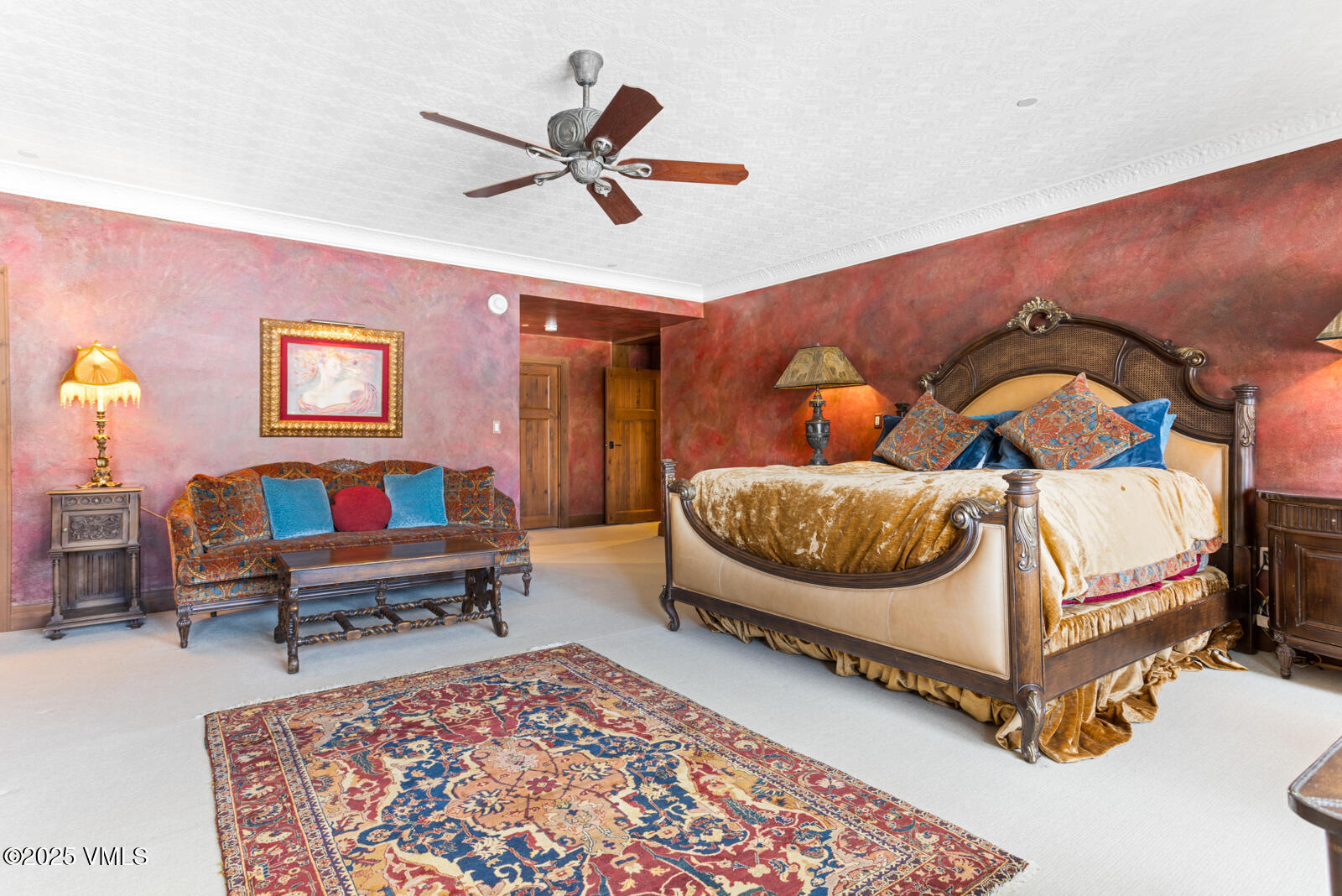 180 Daybreak Ridge Road, Unit 410 Avon, CO 81620 - Photo 15 of 30 a bedroom with furniture and a rug