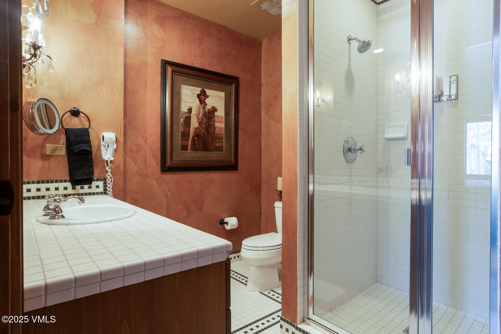 180 Daybreak Ridge Road, Unit 410 Avon, CO 81620 - Photo 20 of 30 a bathroom with a sink a toilet and shower