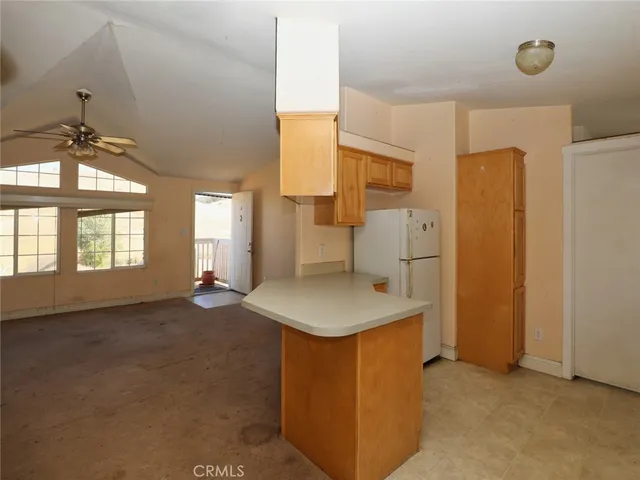 a view of a room with lots of wooden equipment