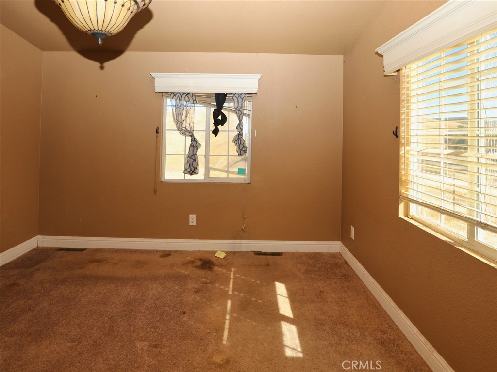 9520 Rocky Creek Road Lower Lake, CA 95457 - Photo 28 of 40 an empty room with a window