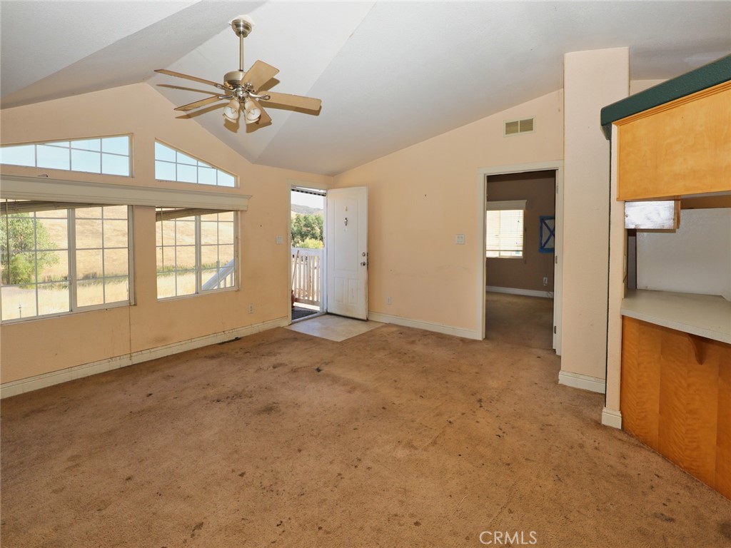 9520 Rocky Creek Road Lower Lake, CA 95457 - Photo 30 of 40 an empty room with fan and windows