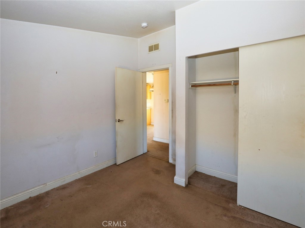 9520 Rocky Creek Road Lower Lake, CA 95457 - Photo 37 of 40 an empty room with closet and a bathroom