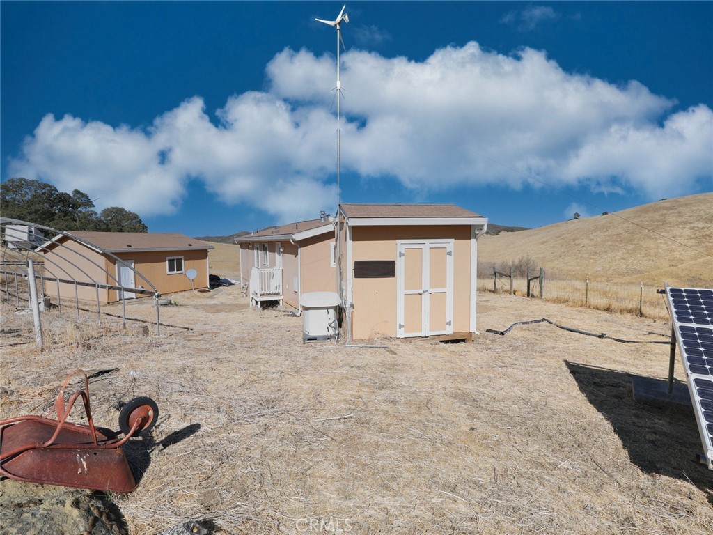 9520 Rocky Creek Road Lower Lake, CA 95457 - Photo 9 of 40 a view of a house with a backyard