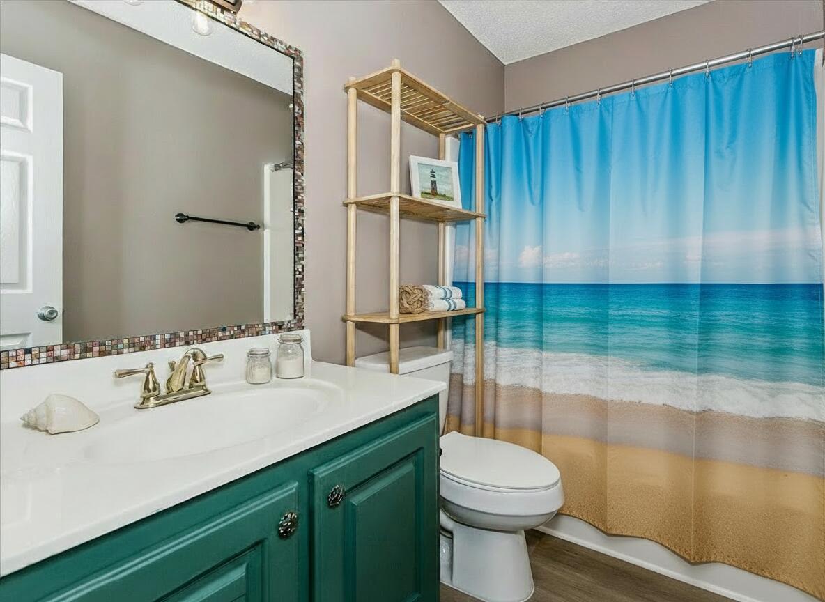 6922 Sea Turtle Circle Navarre, FL 32566 - Photo 19 of 27 Staged Bathroom
