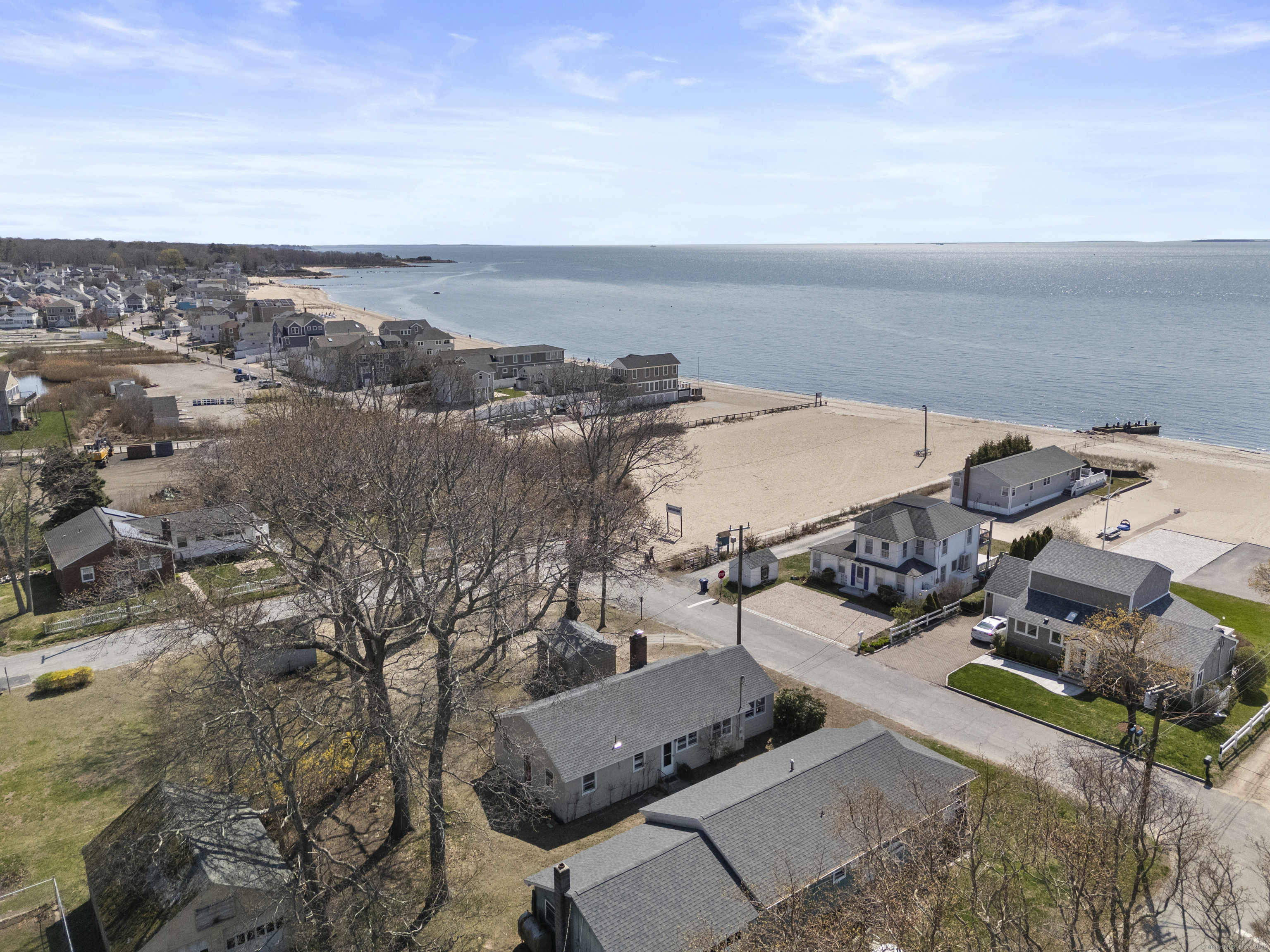 an aerial view of a house with outdoor space