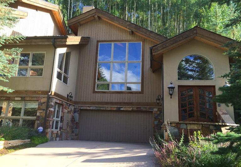 716 West Forest Road, Unit B Vail, CO 81657 - Photo 2 of 8 a front view of a house with a yard