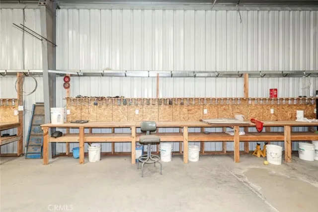 a view of a house with basketball court
