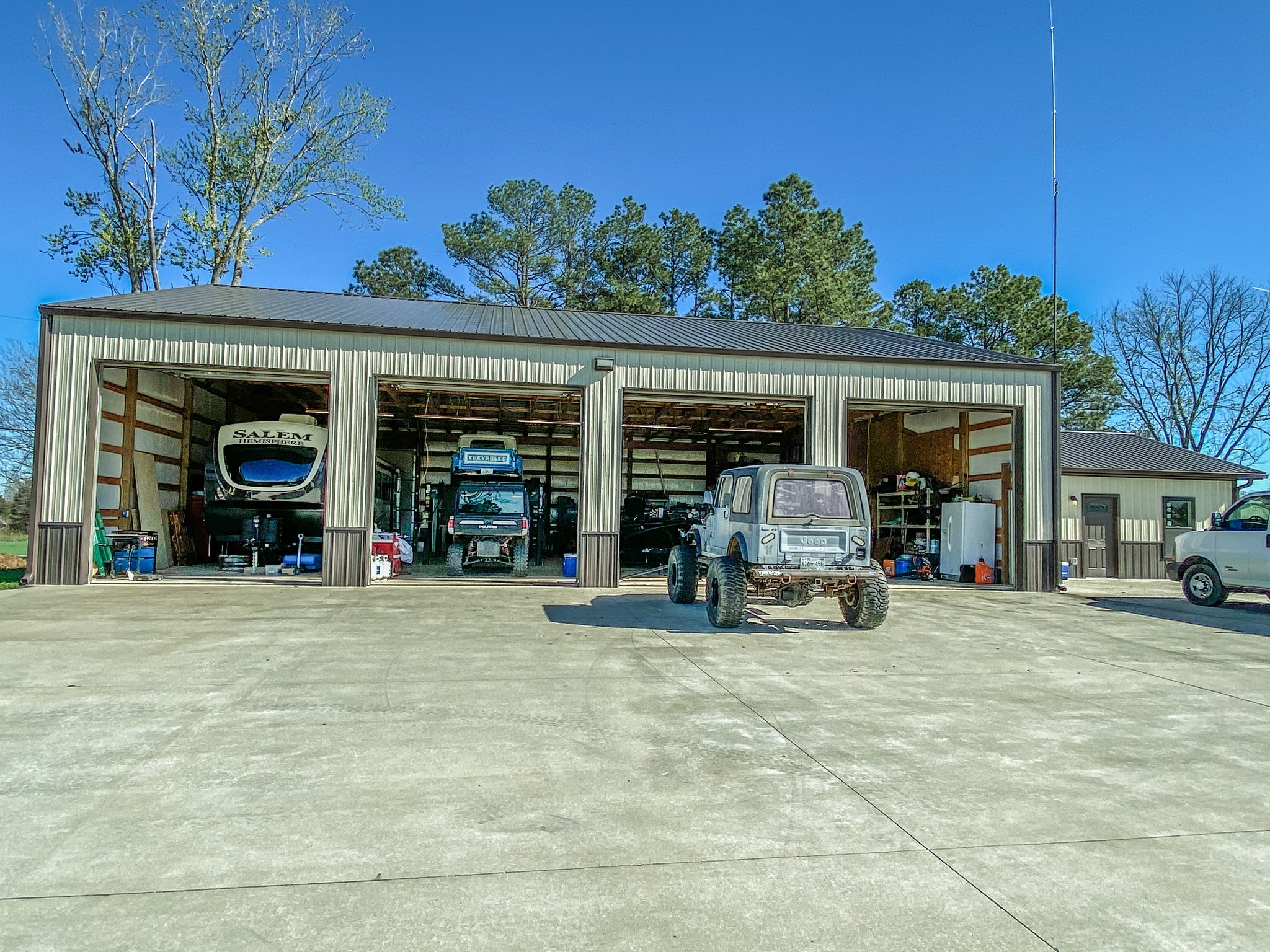 107 Walnut Grove Road Unionville, TN 37180 - Photo 16 of 21 a view of a car park in front of garage