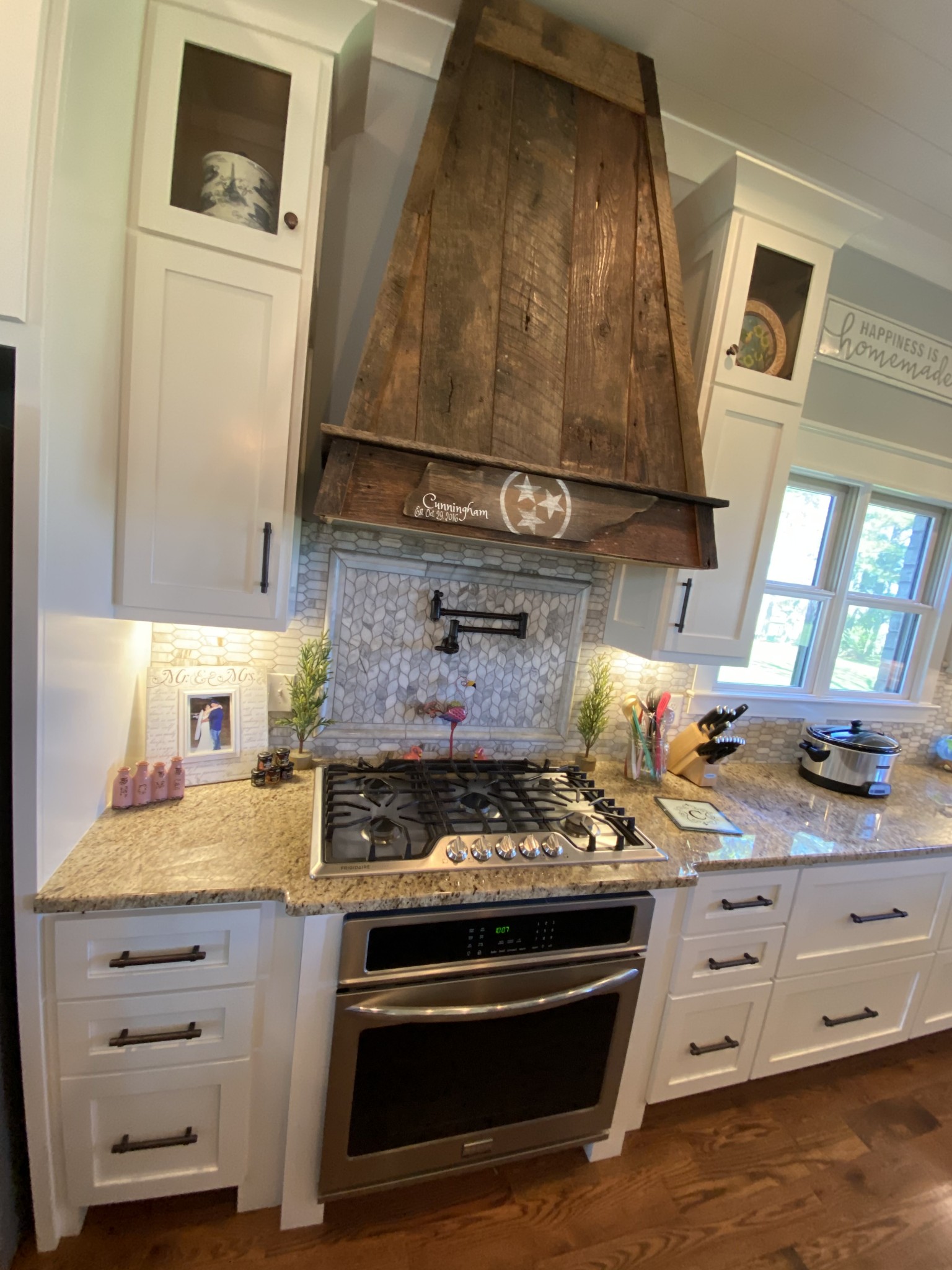 107 Walnut Grove Road Unionville, TN 37180 - Photo 6 of 21 a kitchen with stainless steel appliances granite countertop a stove and a microwave