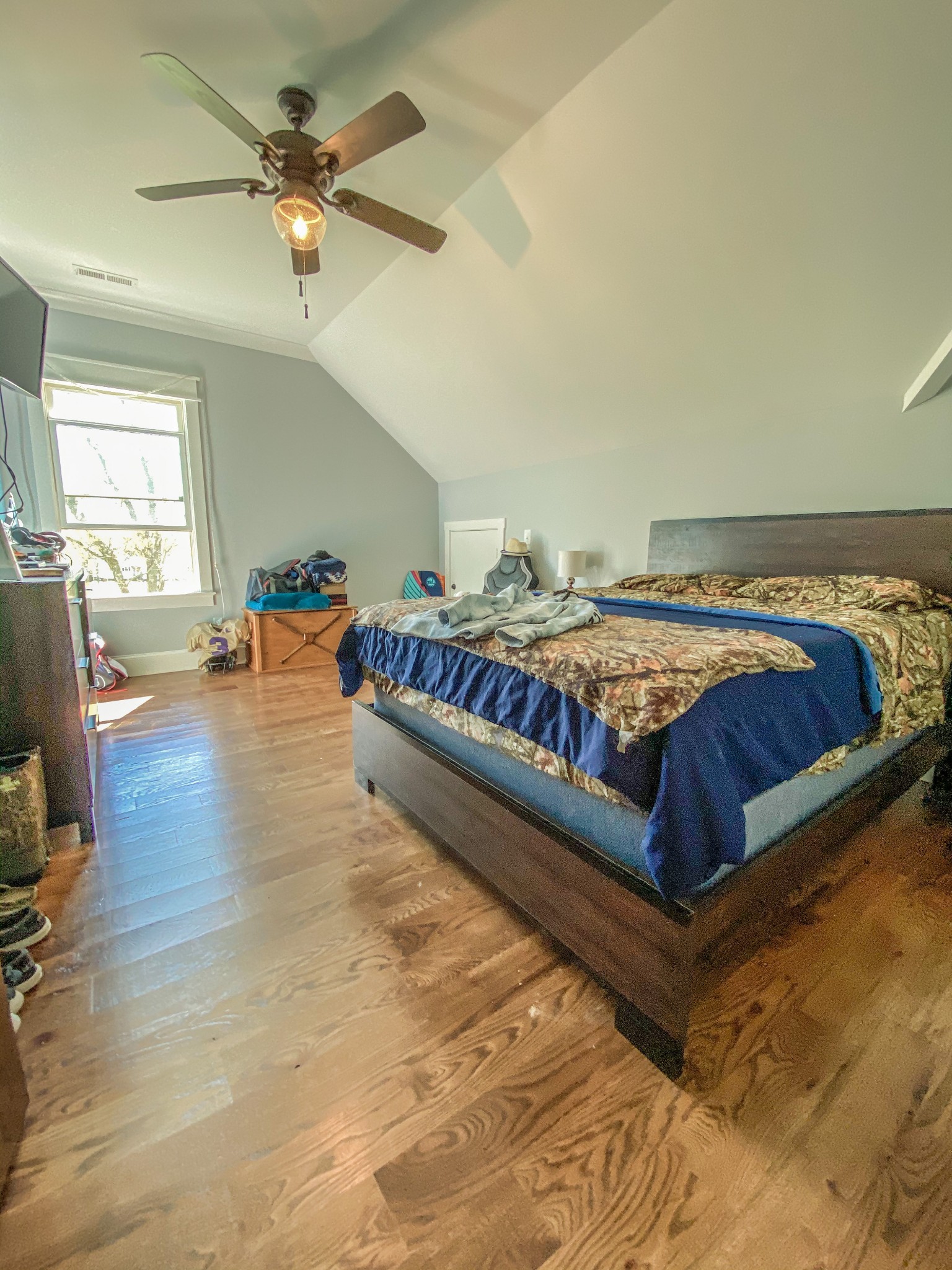 107 Walnut Grove Road Unionville, TN 37180 - Photo 10 of 21 a bedroom with a bed and wooden floor