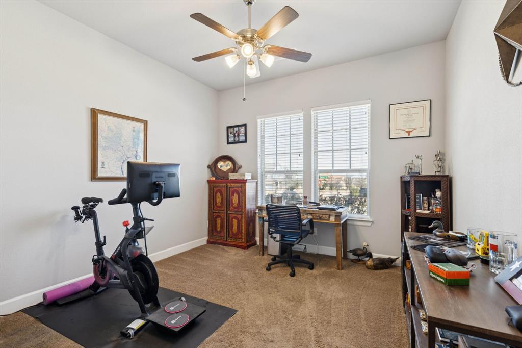 2000 Crescent Street Fort Worth, TX 76008 - Photo 20 of 40 a view of a workspace with gym equipment