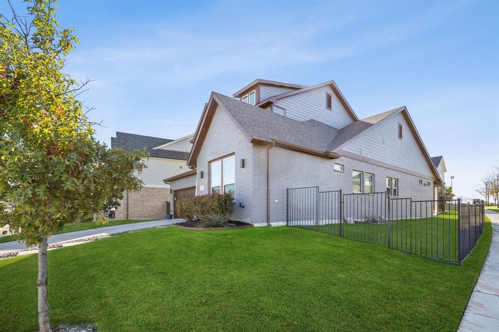 2000 Crescent Street Fort Worth, TX 76008 - Photo 32 of 40 a view of a house with a big yard and large tree