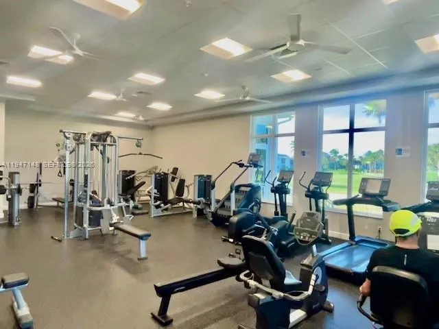 a wooden sign broad in front of the house