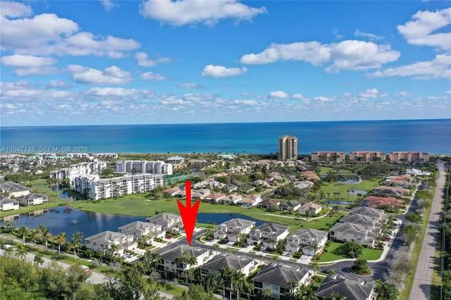 a view of hallway with windows