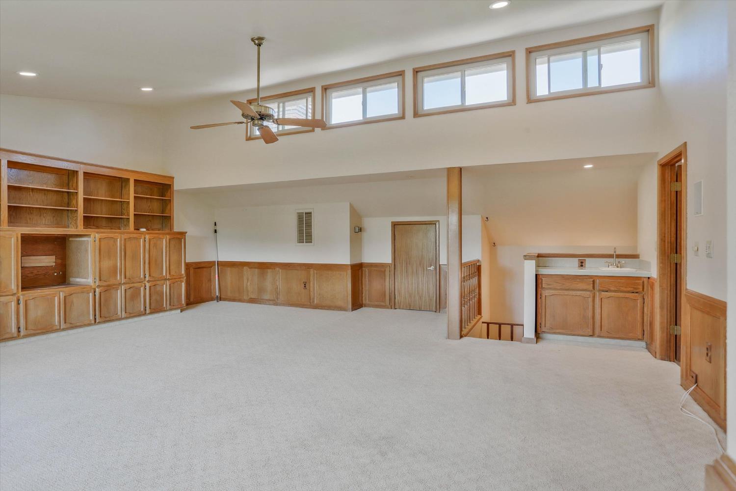 3029 Merrick San Way Carmichael, CA 95608 - Photo 24 of 31 a view of empty room with a ceiling fan