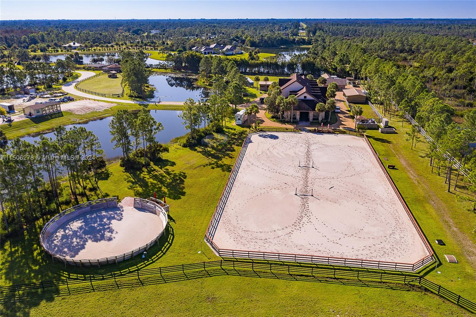 1500 Southeast Ranch Road South Jupiter, FL 33478 - Photo 11 of 29 an aerial view of residential houses with outdoor space