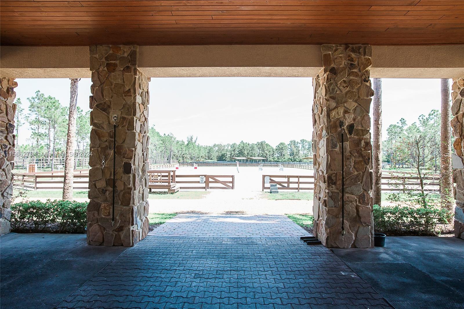1500 Southeast Ranch Road South Jupiter, FL 33478 - Photo 5 of 29 a view of a porch and garden