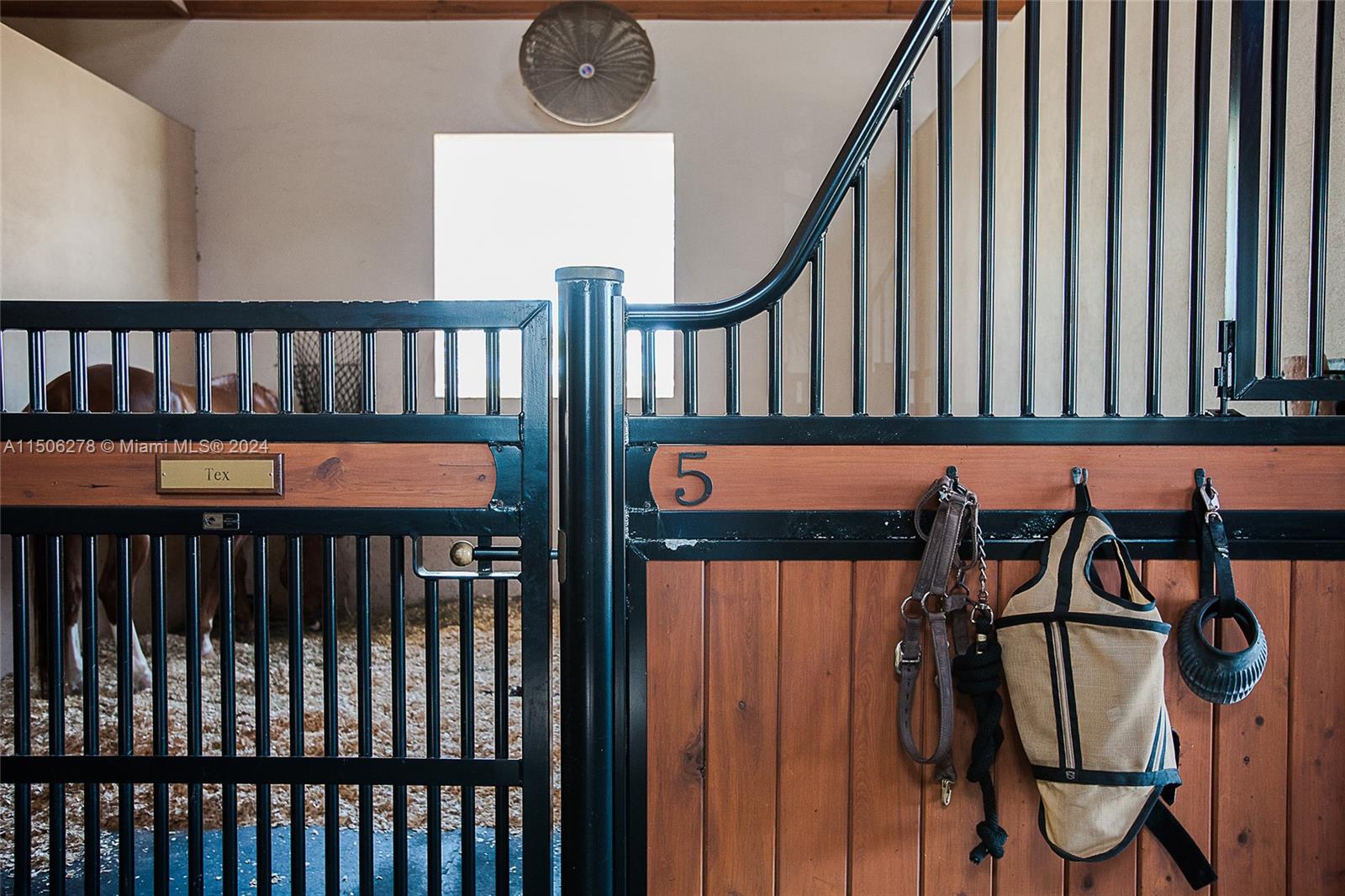 1500 Southeast Ranch Road South Jupiter, FL 33478 - Photo 6 of 29 a view of a porch with furniture