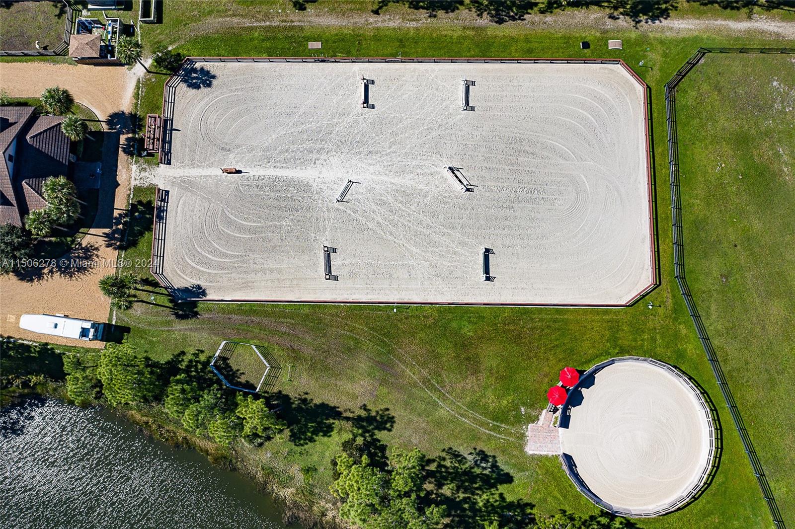1500 Southeast Ranch Road South Jupiter, FL 33478 - Photo 8 of 29 an aerial view of a house with a swimming pool