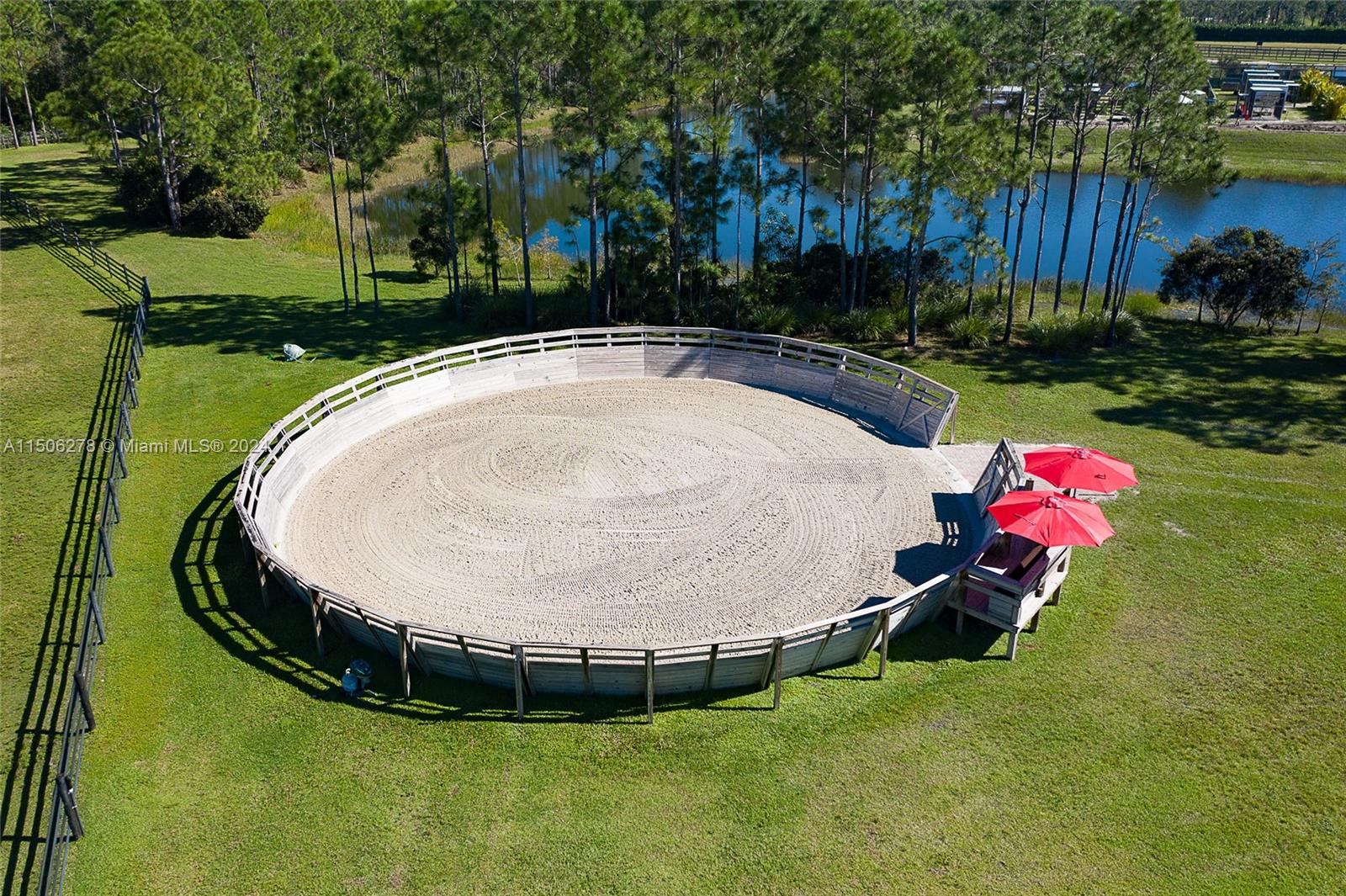 1500 Southeast Ranch Road South Jupiter, FL 33478 - Photo 9 of 29 a swimming pool with outdoor seating and yard
