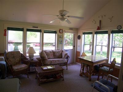 20 Chappaquiddick Road Centerville, MA 02632 - Photo 6 of 22 a living room with furniture and a large window