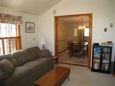 20 Chappaquiddick Road Centerville, MA 02632 - Photo 7 of 22 a living room with furniture and a large window