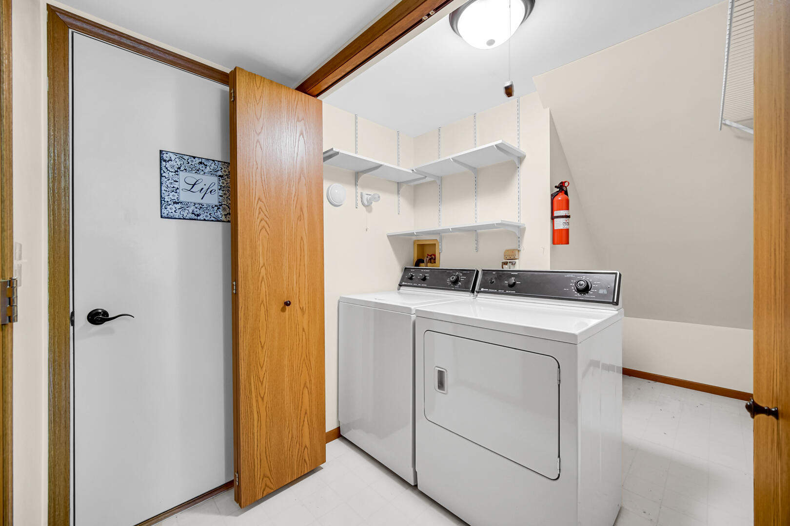 633 West 94th Court Crown Point, IN 46307 - Photo 15 of 29 a room with storage and utility