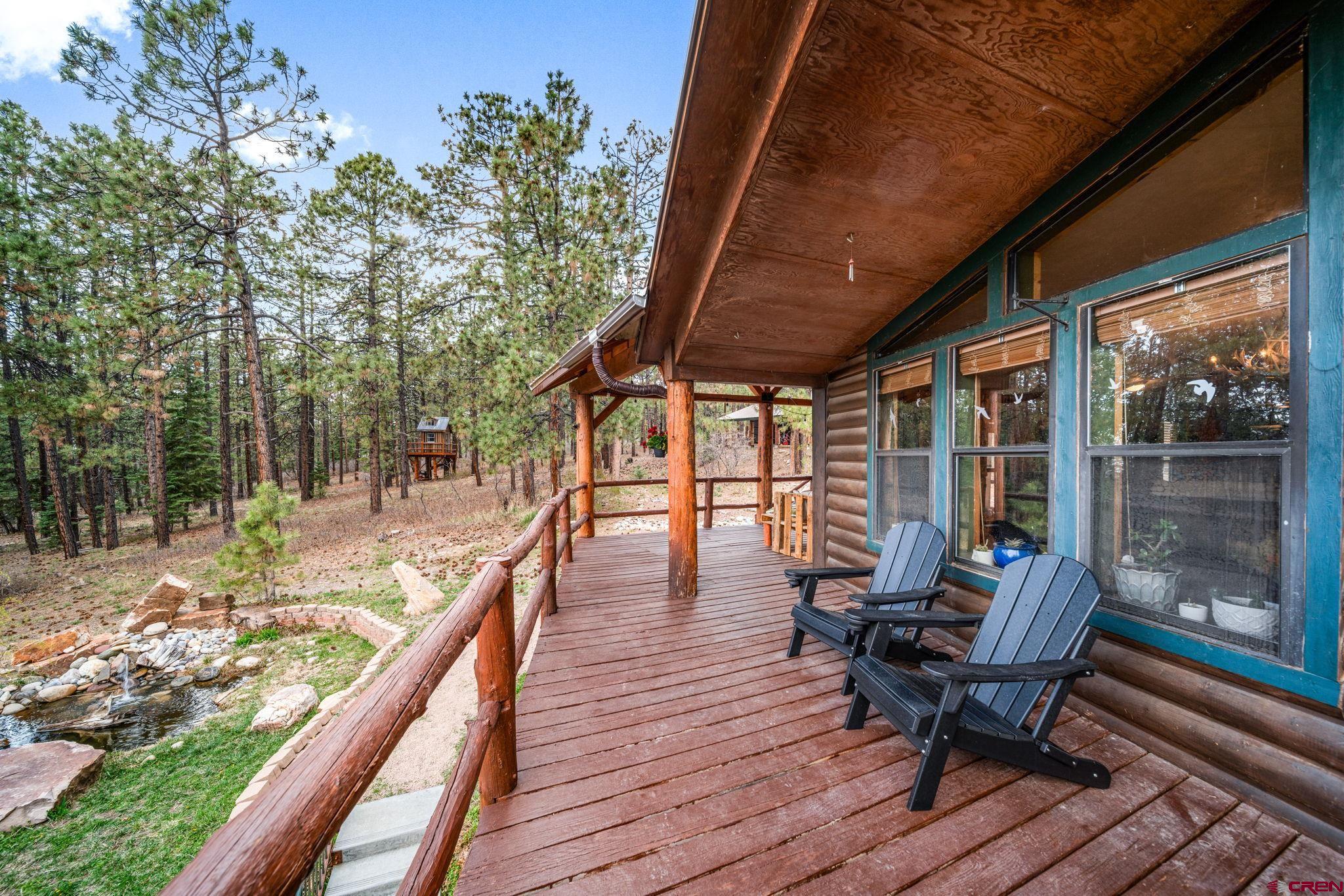1118 Durango Road Durango, CO 81301 - Photo 14 of 32 a view of a two chairs in the balcony