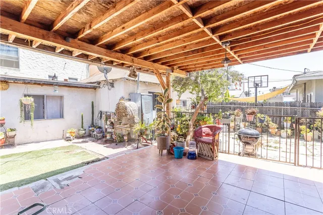 a view of a chairs and tables in patio