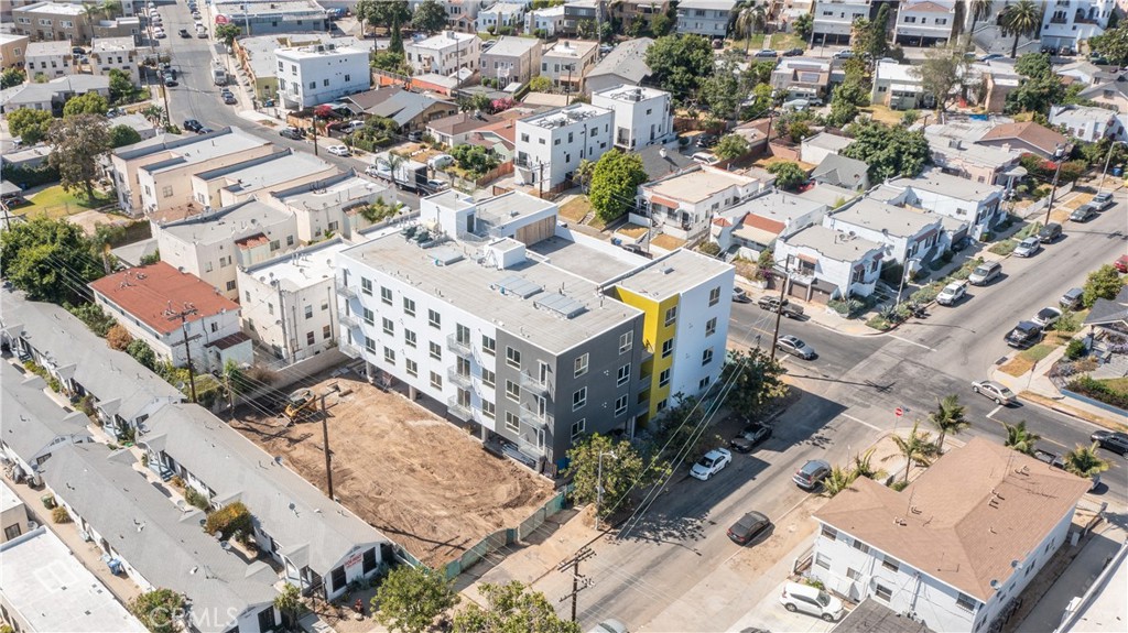 142 North Vendome Street Los Angeles, CA 90026 - Photo 29 of 33 an aerial view of a residential building with an outdoor space