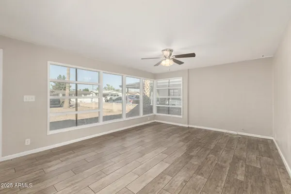 a view of an empty room with a window