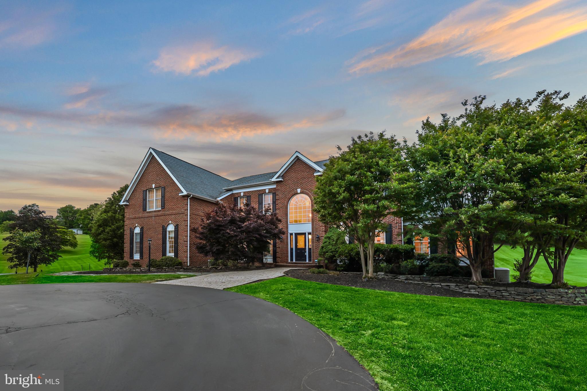 40890 Beechnut Road Leesburg, VA 20175 - Photo 3 of 65 a front view of a house with a yard