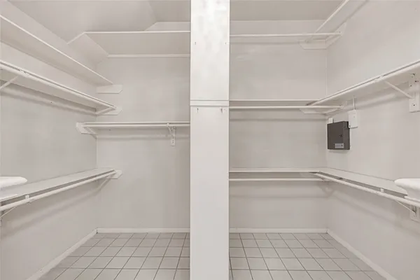 a view of an empty walk in closet