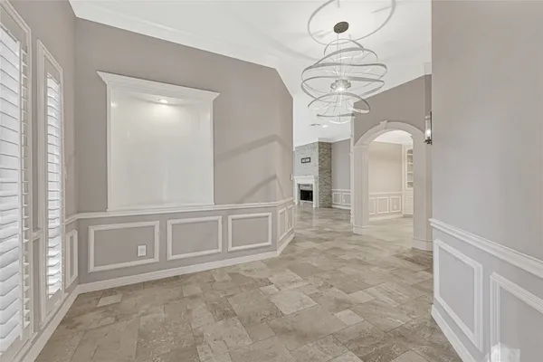 a view of a hallway with front door