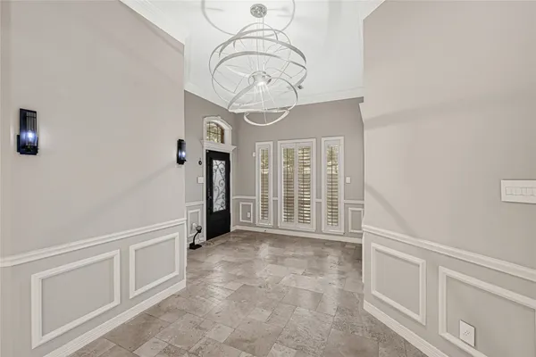 a view of an entryway with a room