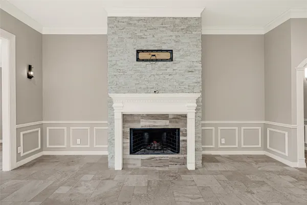 an empty room with fireplace
